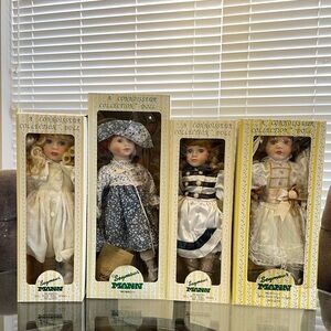 Set of 4 new vintage Seymour Mann handmade antique porcelain hand painted dolls